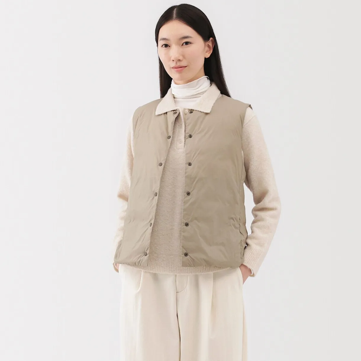 Doudoune légère pliable en nylon recyclé sans manche sans col pour femme