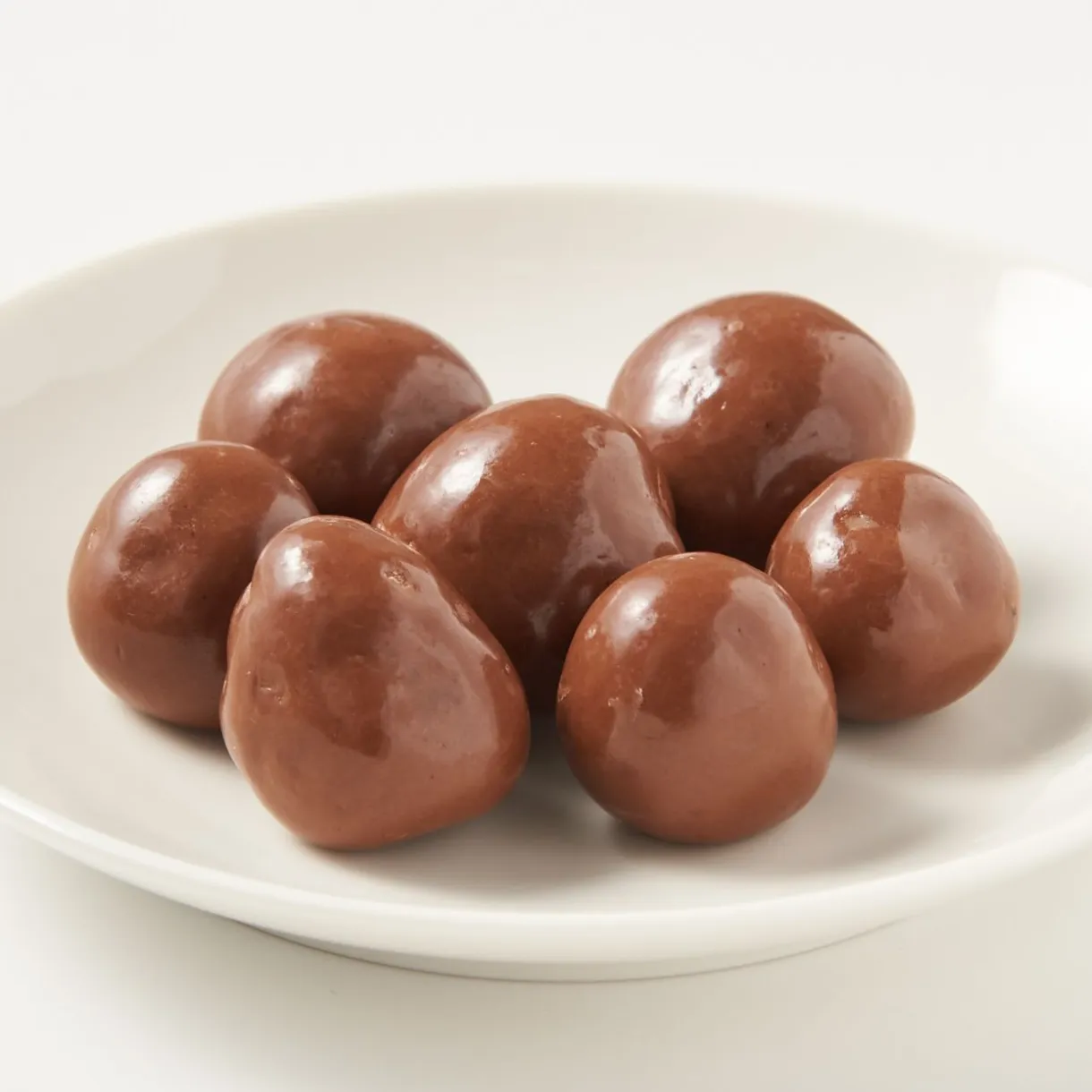 Frambroises enrobées de chocolat au lait
