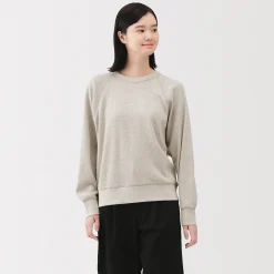 Pull à col rond en coton biologique tricoté gaufré pour femme