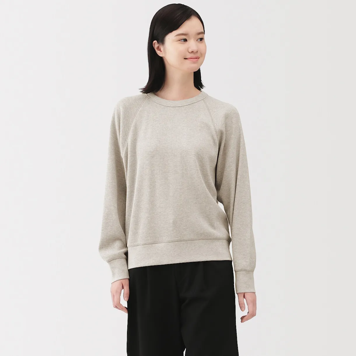 Pull à col rond en coton biologique tricoté gaufré pour femme