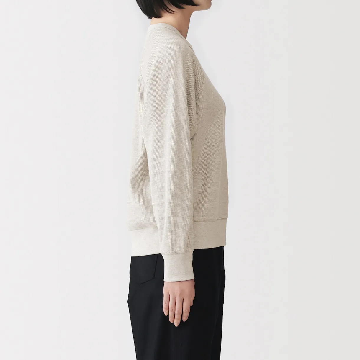 Pull à col rond en coton biologique tricoté gaufré pour femme