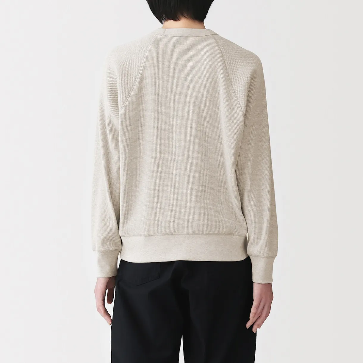 Pull à col rond en coton biologique tricoté gaufré pour femme