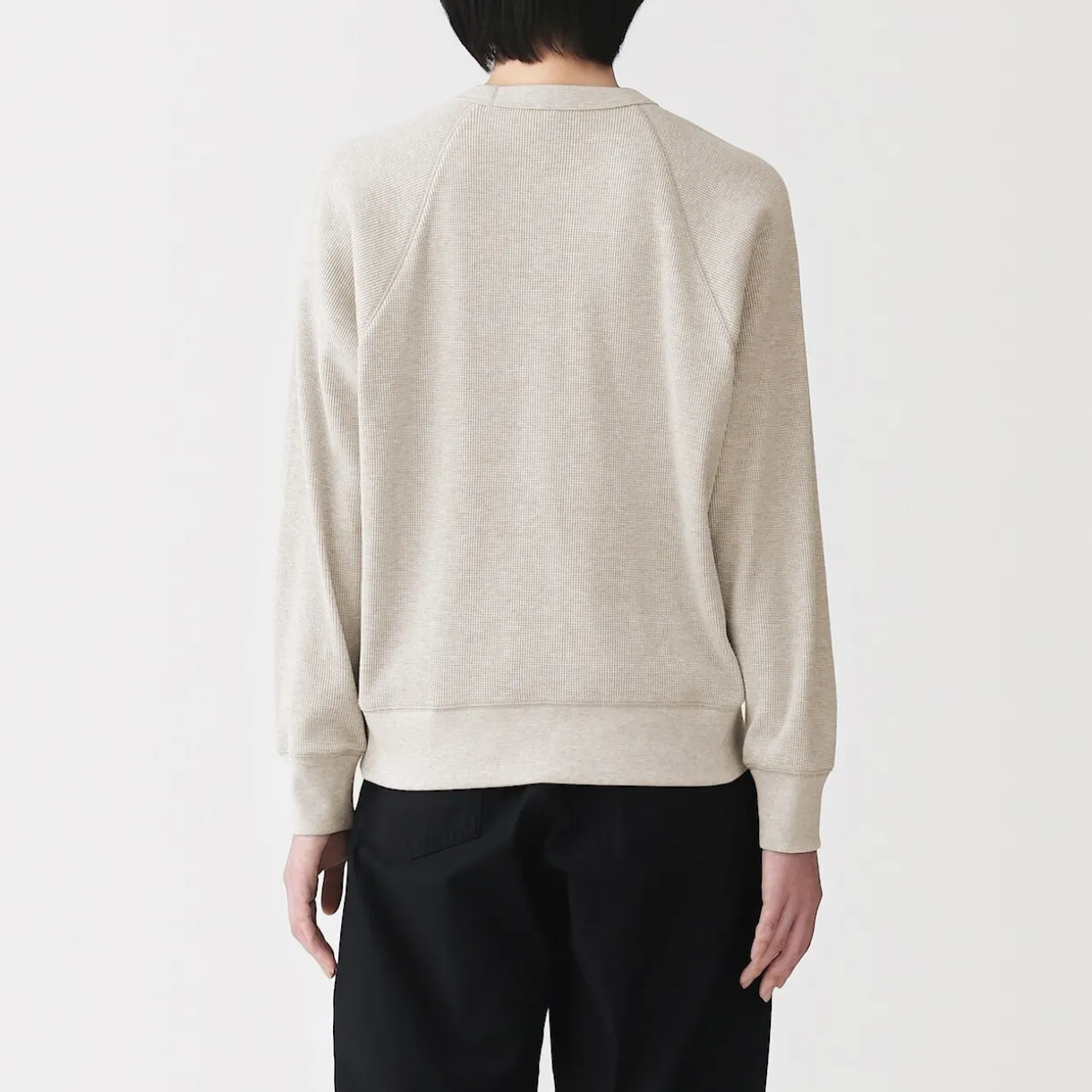 Pull à col rond en coton biologique tricoté gaufré pour femme