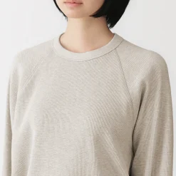 Pull à col rond en coton biologique tricoté gaufré pour femme