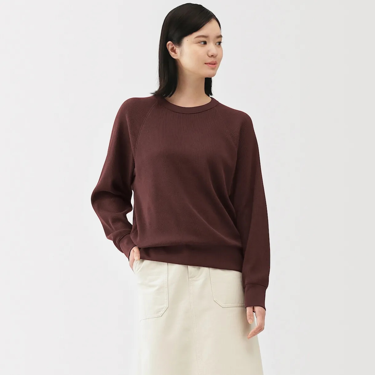 Pull à col rond en coton biologique tricoté gaufré pour femme